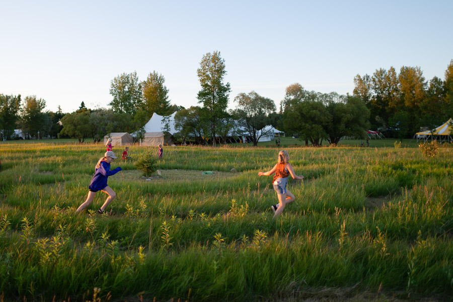 …though labyrinth cut in grass provides a bit of structure for play.