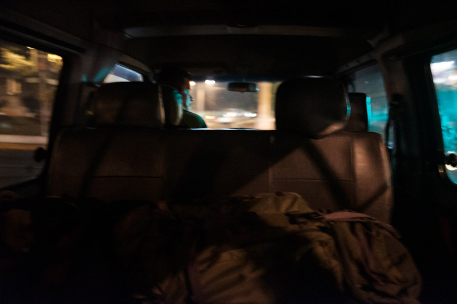 The blur from the back seat of a shuttle out of a dark Guatemala City.