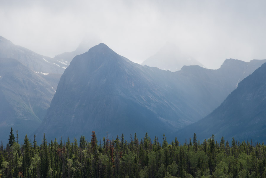 Summertime in the Canadian Rocky Mountains means moody mountain skies. Cruising in the open air, afternoons were spent dodging rogue rain clouds and strong winds.