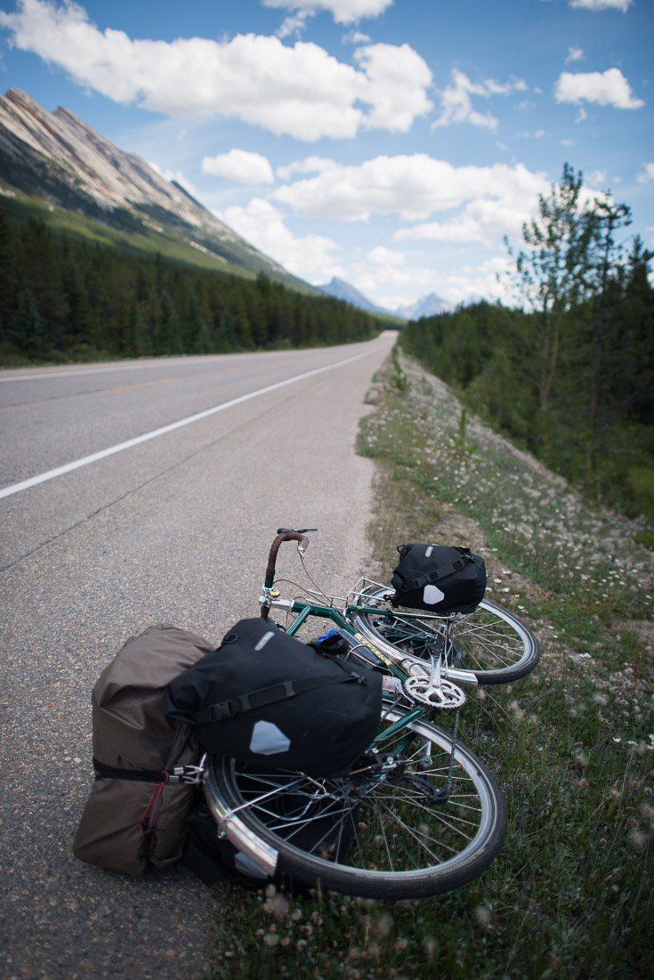With a loaded bicycle it’s a little more difficult to park and dismount than it is on an unloaded bike. Almost every day, I laid my heavy bike down on the side of the road to clear dangerous debris; it’s amazing how many spare tires bounce out of motor vehicles.
