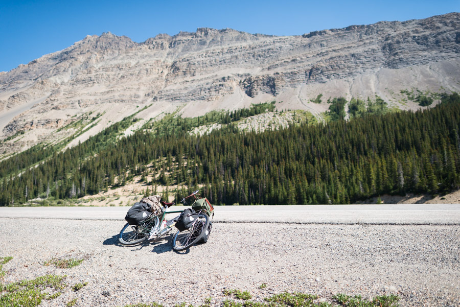 Approaching the highest road elevation on this route at just over 2000 meters above sea level. Note distant Wilcox Peak looming over the road.