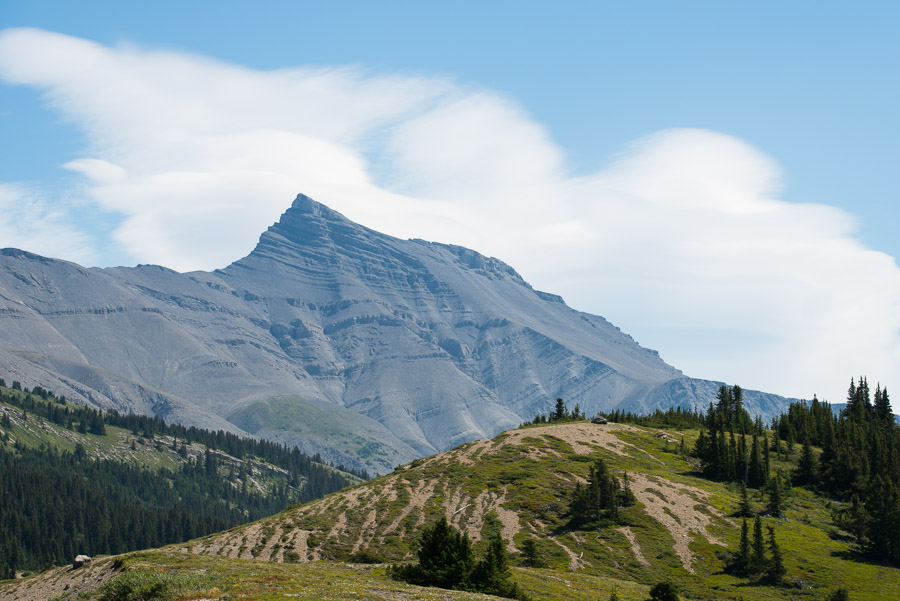 Altostratus clouds outline barren Nigel Peak.