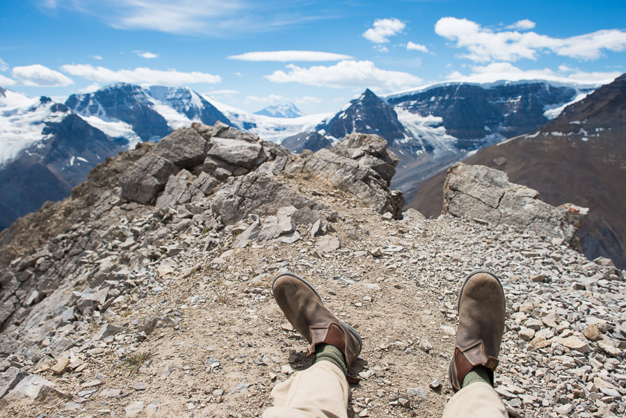 Sitting on the peak of Mount Wilcox after a tough scramble. Beyond Wilcox Pass the path disappears and you have to pick your route to the peak. The way that I chose was relatively easy towards the beginning, but got staggeringly difficult towards the peak. Struggling up sharp, loose rock and steep gorges I bouldered my way to the peak. This is the highest point (literally) of the entire tour at 2884 meters above sea level.