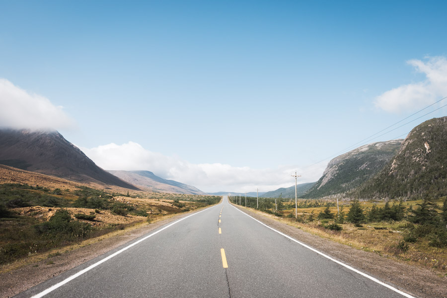 The road beneath, some tuckamore to the right, and the earth’s bare mantle to the left. Moving west across the island of Newfoundland, the landscape shifts as you make your way from one tectonic plate to another. The ancient collision point between the two in Gros Morne National Park is a geological wonder, and this road that cuts through it showcases its wide diversity from north to south and east to west.