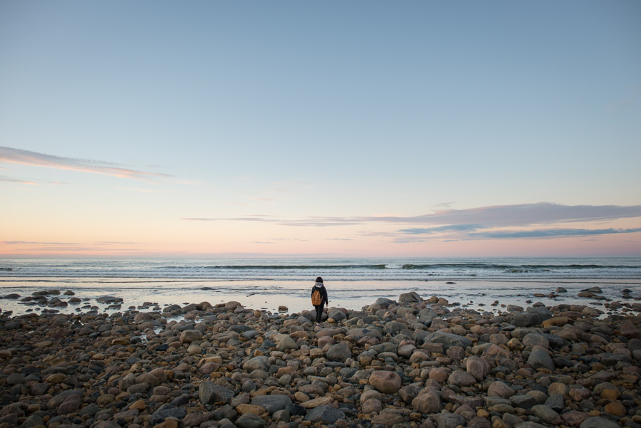 Silhouetted against a beautiful northern sunset. There’s something that draws us to the water wherever we find ourselves at sunset, even this far north.
