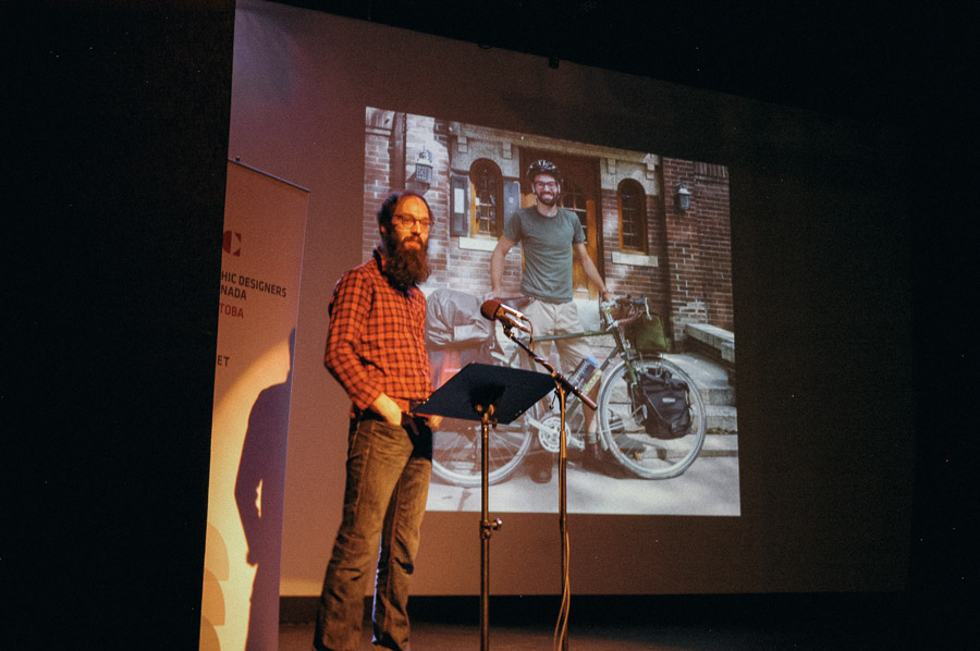 Update: Here’s a photo of yours truly (David Quiring) presenting, taken by John Lyttle.