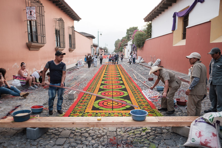 Over many hours, an intricate alfombra is created in the streets of Antigua - its colorful flowers and dust to soon be swept away by the feet of a Semana Santa procession.Context: Part of a month spent in Guatemala (April 2017), participating in the unique ceremonies blending Mayan and Spanish traditions leading up to Easter. &ndash;link forthcoming&ndash;